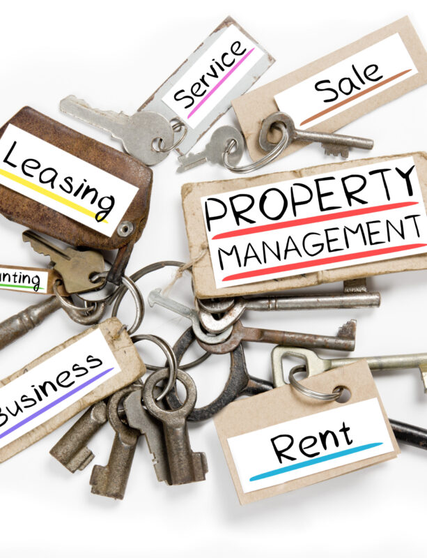 Photo of key bunch and paper tags with PROPERTY MANAGEMENT conceptual words
